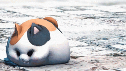 A Calico Cat Is Sitting On A Brick Floor GIF