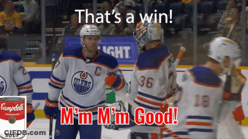 A Can Of Campbell 'S Soup Is Next To A Hockey Player GIF