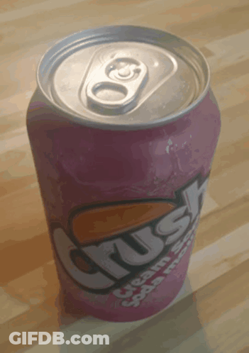 A Can Of Crush Cream Soda Sits On A Wooden Surface GIF