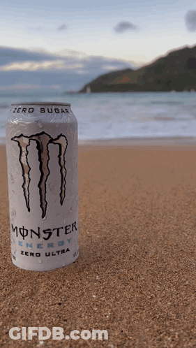 A Can Of Monster Energy Sits On The Beach GIF