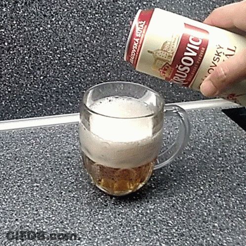 A Can Of Musovic Is Poured Into A Glass Of Beer GIF