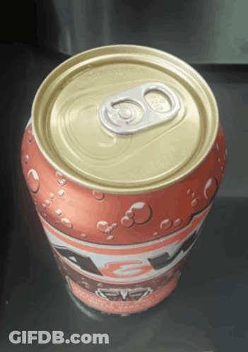 A Can Of Soda With The Top Open And The Number 80 On It GIF
