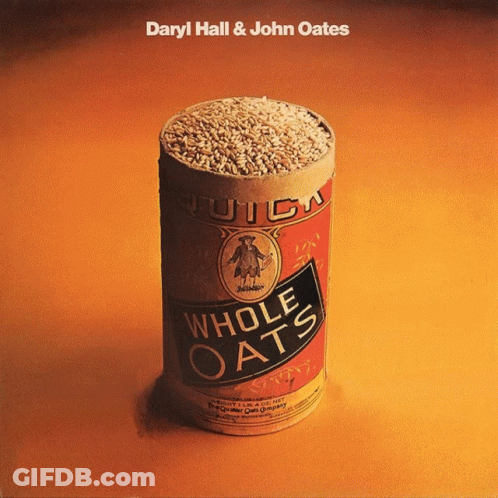 A Can Of Whole Oats Sits On An Orange Surface GIF