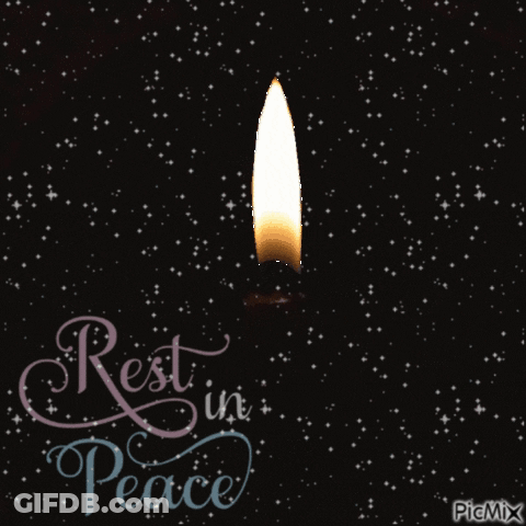 A Candle Is Lit Up In The Dark With The Words Rest In Peace Below It GIF