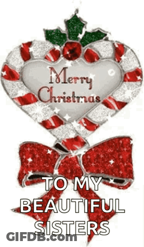 A Candy Cane In The Shape Of A Heart With The Words `` Merry Christmas To My Beautiful Sisters '' On It . GIF
