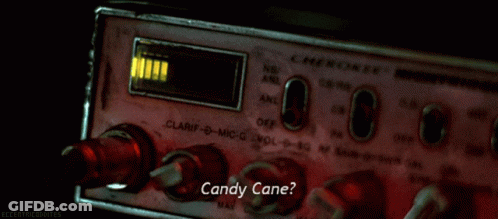 A Candy Cane Sign Is Displayed On A Radio GIF