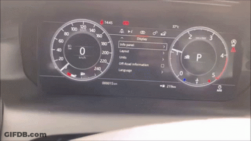 A Car Dashboard Shows The Time As 14:45 GIF