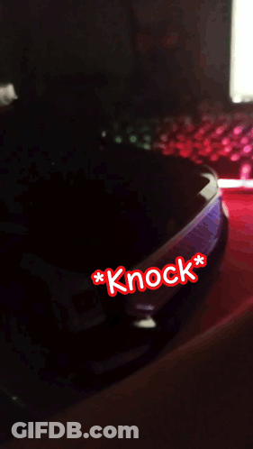 A Car Headlight With The Word Knock On It GIF