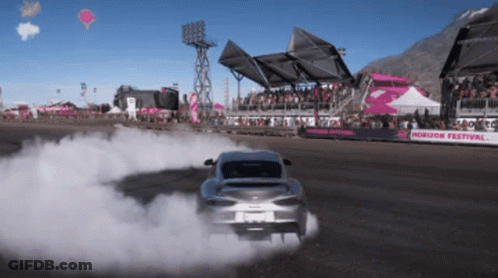 A Car Is Drifting On A Track That Says Horizon Festival On It GIF