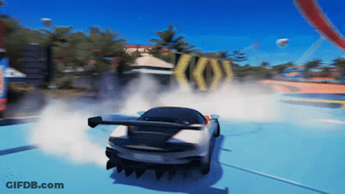 A Car Is Drifting On A Track With A Sign That Says ' X ' On It GIF