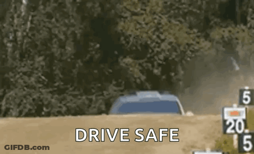 A Car Is Driving Down A Dirt Road And The Words `` Drive Safe '' Are Visible . GIF
