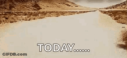 A Car Is Driving Down A Dirt Road In The Desert With The Words `` Today '' Written On It . GIF