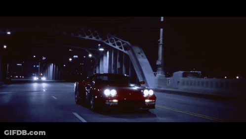 A Car Is Driving Down A Highway At Night And Has A License Plate That Says ' Lc ' On It GIF