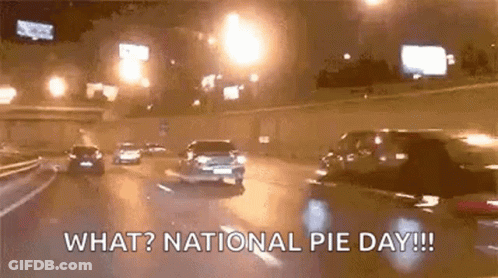 A Car Is Driving Down A Highway At Night With The Words `` What ? National Pie Day !! '' GIF