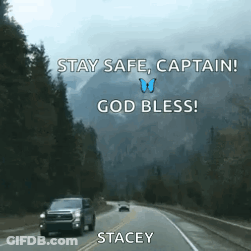 A Car Is Driving Down A Highway With Mountains In The Background And A Butterfly Flying In The Sky . GIF