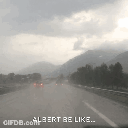 A Car Is Driving Down A Highway With The Words Albert Be Like Below It GIF