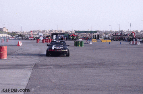 A Car Is Driving Down A Road With A Sign That Says Imgflip.com On The Bottom GIF