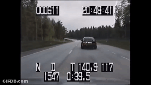 A Car Is Driving Down A Road With A Time Stamp Of 19:48 GIF