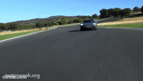 A Car Is Driving Down A Road With Motorweek.org Written On The Bottom Right GIF