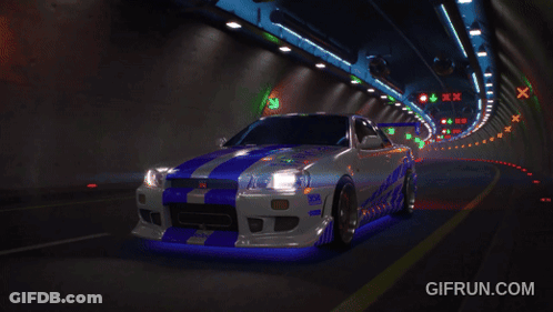 A Car Is Driving Down A Tunnel With A Sign That Says 40 GIF