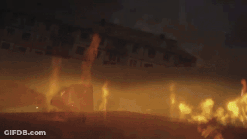 A Car Is On Fire In The Dark GIF