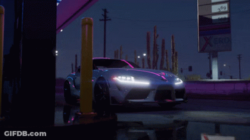 A Car Is Parked At A Gas Station With A Sign That Says Xerox On It GIF