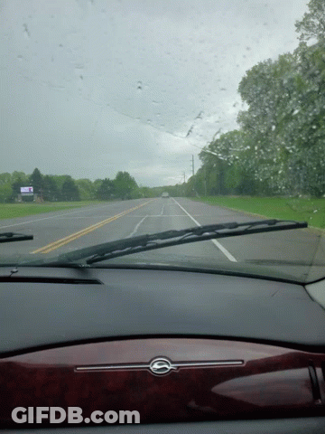 A Car Windshield With A Sign That Says ' I 'M Sorry I 'M Late ' On It GIF