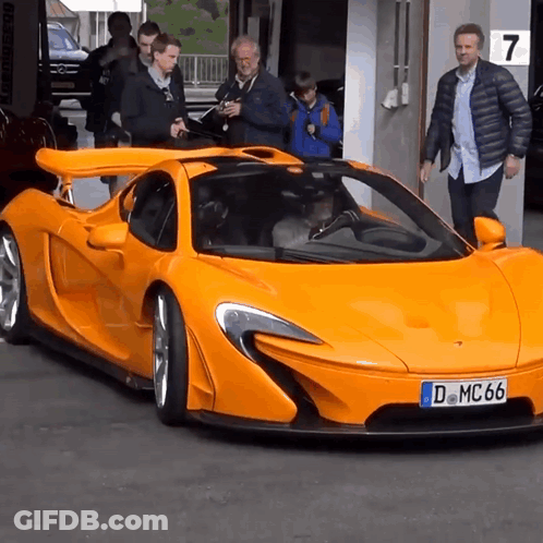 A Car With A License Plate That Says Dmc66 GIF