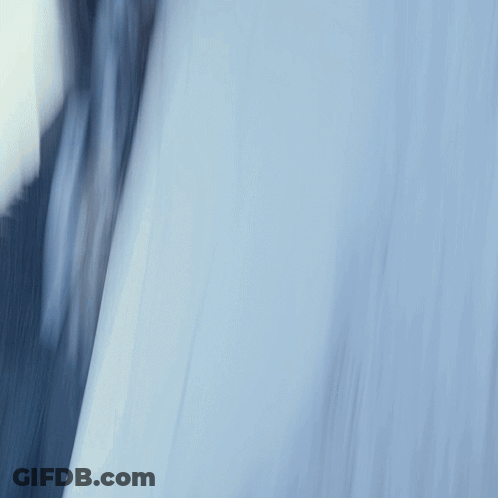 A Car With A License Plate That Says Gsl 9747 Is Parked In The Snow GIF