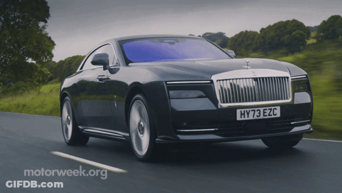 A Car With A License Plate That Says Hy73 Ezc Is Driving Down A Road GIF