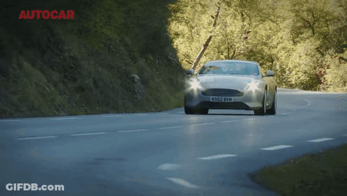 A Car With A License Plate That Says Kx82 Bvm GIF