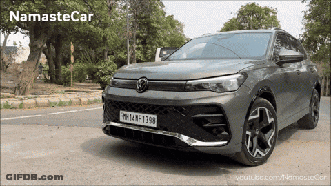 A Car With A License Plate That Says Mh14nf 1298 GIF