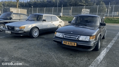 A Car With A License Plate That Says Pr-633-B Is Parked Next To Another Car GIF