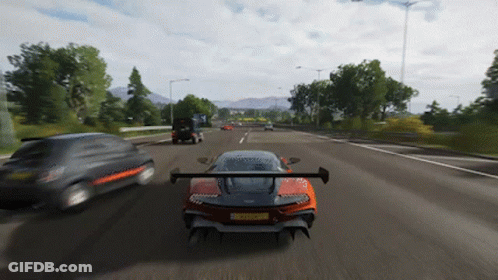 A Car With A License Plate That Says ' Rc Tf ' On It Is Driving Down A Road GIF