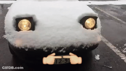 A Car With A License Plate That Says T2-9 Is Covered In Snow GIF