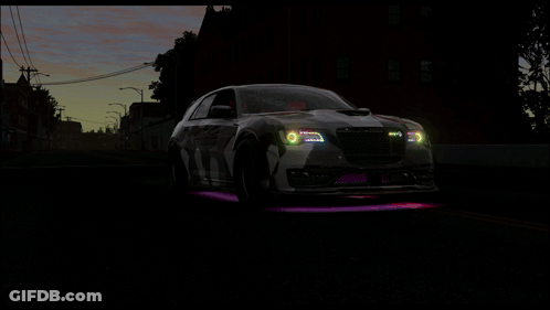 A Car With Purple And Green Lights On The Front GIF