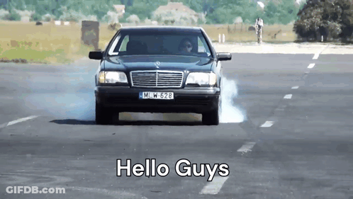 A Car With The License Plate Mlw 628 Is Driving Down A Road GIF