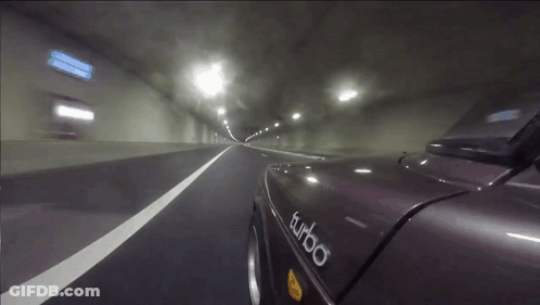 A Car With Turbo Written On The Side Of It GIF