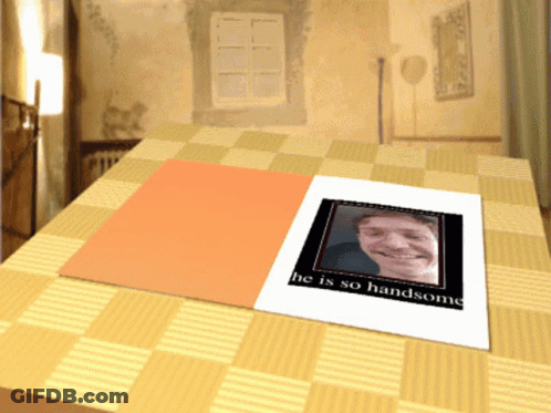 A Card With A Picture Of A Man And The Words He Is So Handsome On It GIF