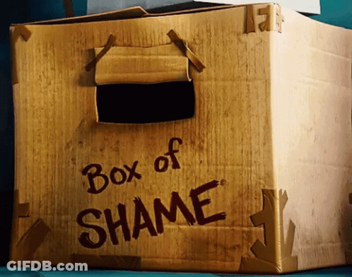 A Cardboard Box That Says Box Of Shame On The Side GIF