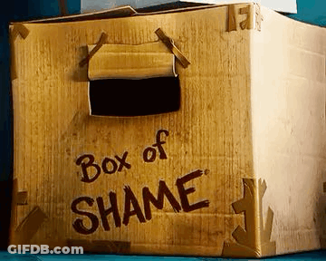A Cardboard Box With The Words Box Of Shame Painted On It GIF