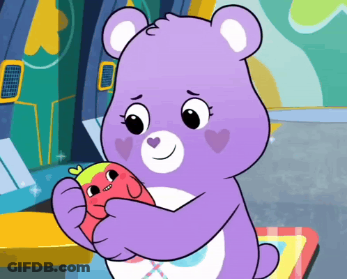 A Care Bear Is Holding A Stuffed Animal In Its Arms GIF