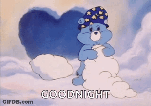 A Care Bear Is Sitting On A Cloud Holding A Pillow And Wearing A Sleep Cap . GIF