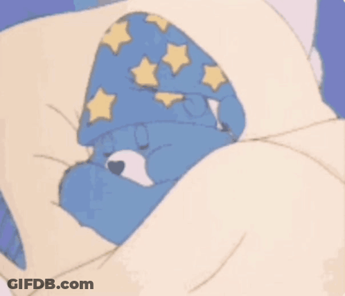 A Care Bear Is Sleeping In A Bed With The Words Sweet Dreams Above Him GIF