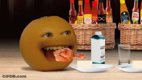 A Carton Of Lost Milk Sits On A Plate In Front Of A Basket Of Hot Sauce GIF
