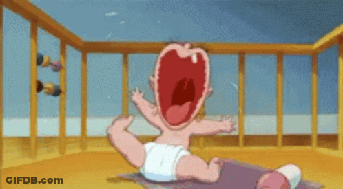 A Cartoon Baby Is Crying In A Crib . GIF