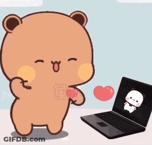 A Cartoon Bear Is Standing In Front Of A Laptop GIF