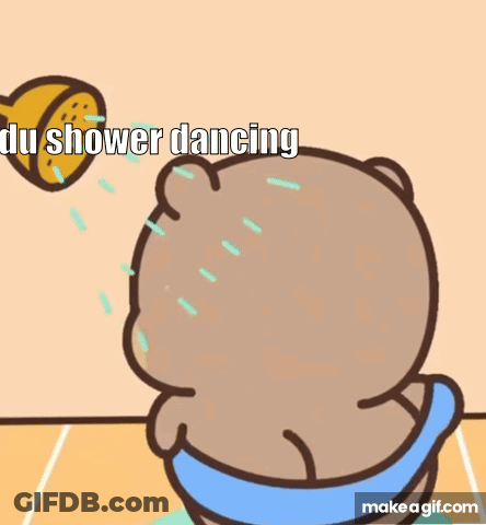 A Cartoon Bear Is Taking A Shower And Dancing GIF