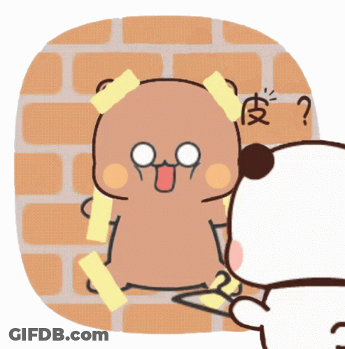 A Cartoon Bear Is Taped To A Brick Wall And Has A Question Mark Next To It GIF