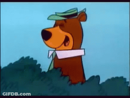 A Cartoon Bear Is Wearing A Hat And Tie . GIF